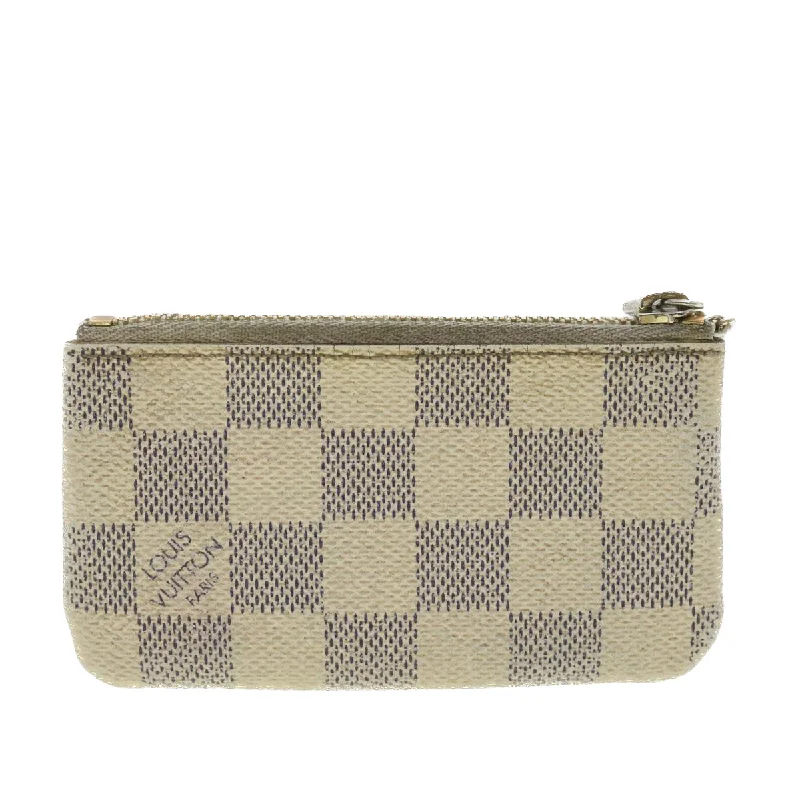 Ladies Louis Vuitton Petite Malle bags in a pastel color for a soft lookLOUIS VUITTON Damier Azur Pochette Cles Coin Purse N62659 LV Auth 38447