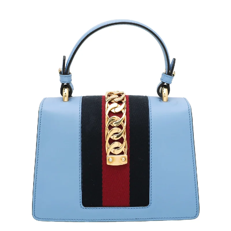 Women Gucci bags with a detachable mobile phone holderGucci Blue Sylvie Top Handle Mini Bag