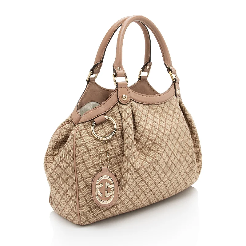 Ladies Gucci Dionysus bags in a pastel colorGucci Diamante Canvas Sukey Medium Tote (XTmENi)