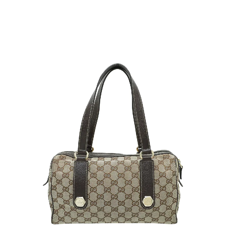 Women Gucci crossbody bags with a woven leather strapGucci GG Canvas Small Charmy Boston Bag