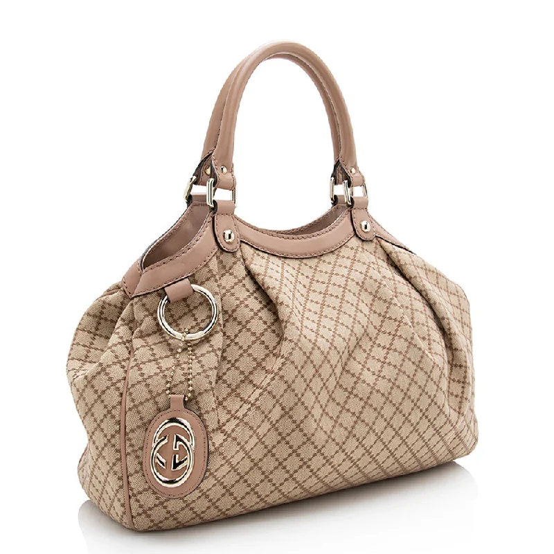 Women Gucci bags with a chain - link trim and a leather bodyGucci Diamante Canvas Sukey Medium Tote (21645)