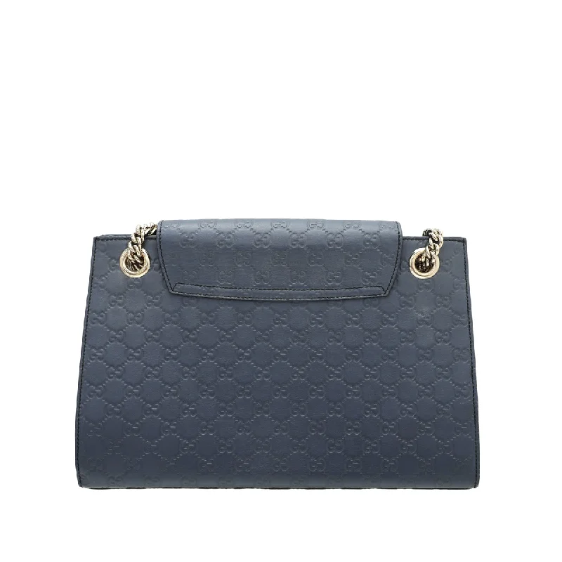 Ladies Gucci handbags with a detachable coin purse insideGucci Blue Guccissima Emily Bag