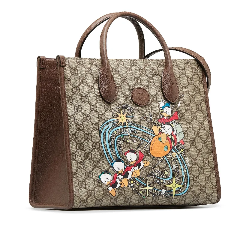 Gucci Marmont bags for women with gold - toned hardwareGucci x Disney GG Supreme Donald Duck Tote (SHG-mJ8LfU)