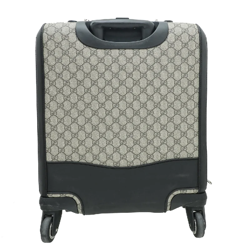 Ladies Gucci Dionysus bags with a star - shaped charmGucci Bicolor GG Supreme Carry On Suitcase Bag