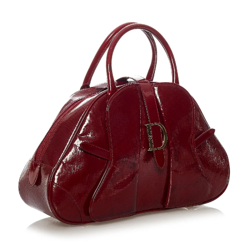 Christian Dior Saddle bags with a patent leather finish for a shiny lookDior Patent Leather Saddle Dome Handbag (28563)