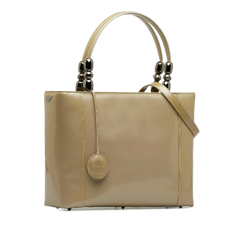 Christian Dior backpacks with a sleek, minimalist silhouetteDIOR Patent Malice Pearl Satchel