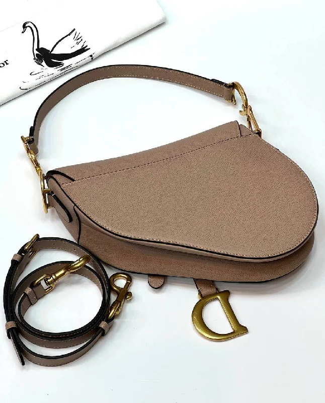 Christian Dior Saddle bags with a studded trim for a bold lookDior SADDLE Bag Taupe WITH STRAP